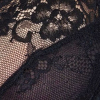 Biustonosz miękki na fiszbinach z eleganckiej czarnej koronki Wonder Lace 2442 Sielei